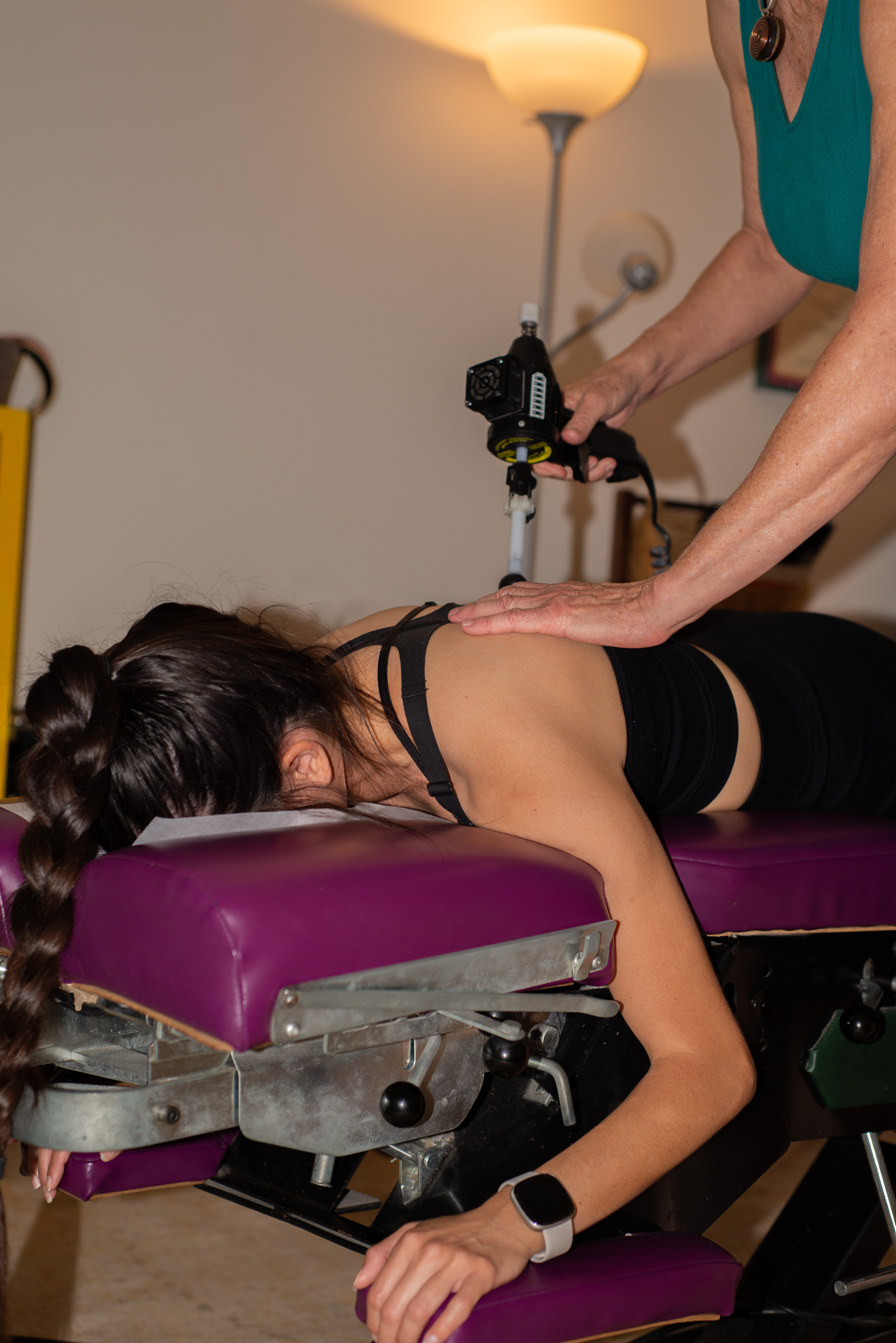 Dr. Cynthia Schade of Active Life Chiropractic performing services on a patient