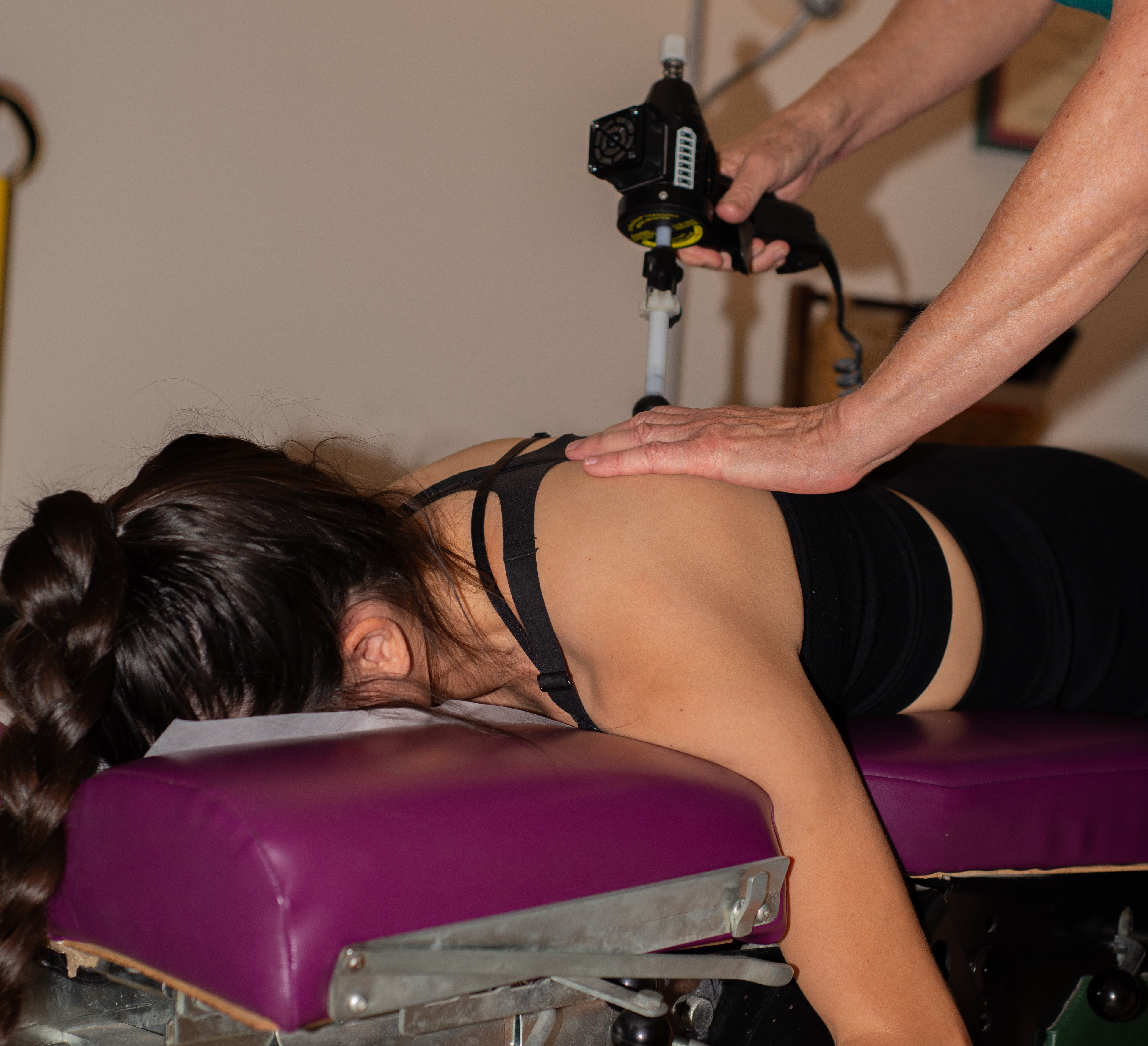 Dr. Cynthia Schade of Active Life Chiropractic performing services on a patient